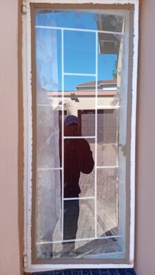 Putty glazing on steel window frame with putty glazing Johannesburg GET glass